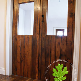 Pair of Guinness board double planked parlour doors