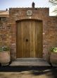 Pair of hand-made arched court-yard doors & frame