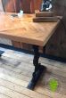 Bespoke woodblock table top with old cast iron legs