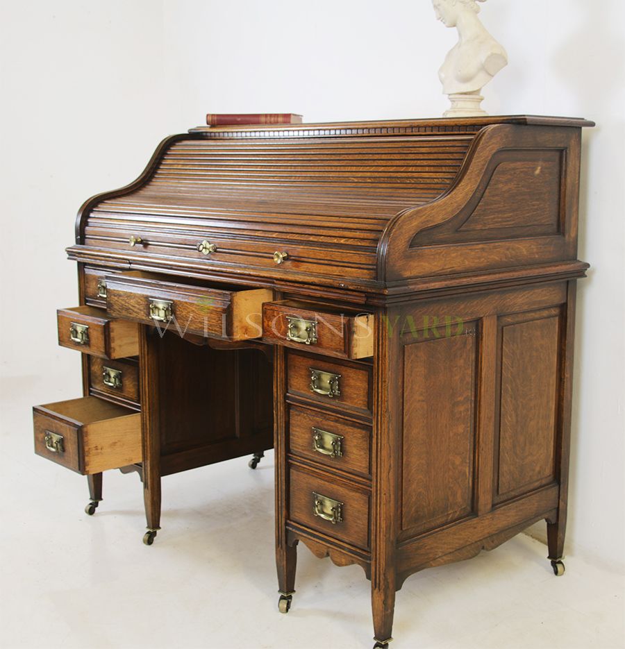 Roll top desk with clearance drawers