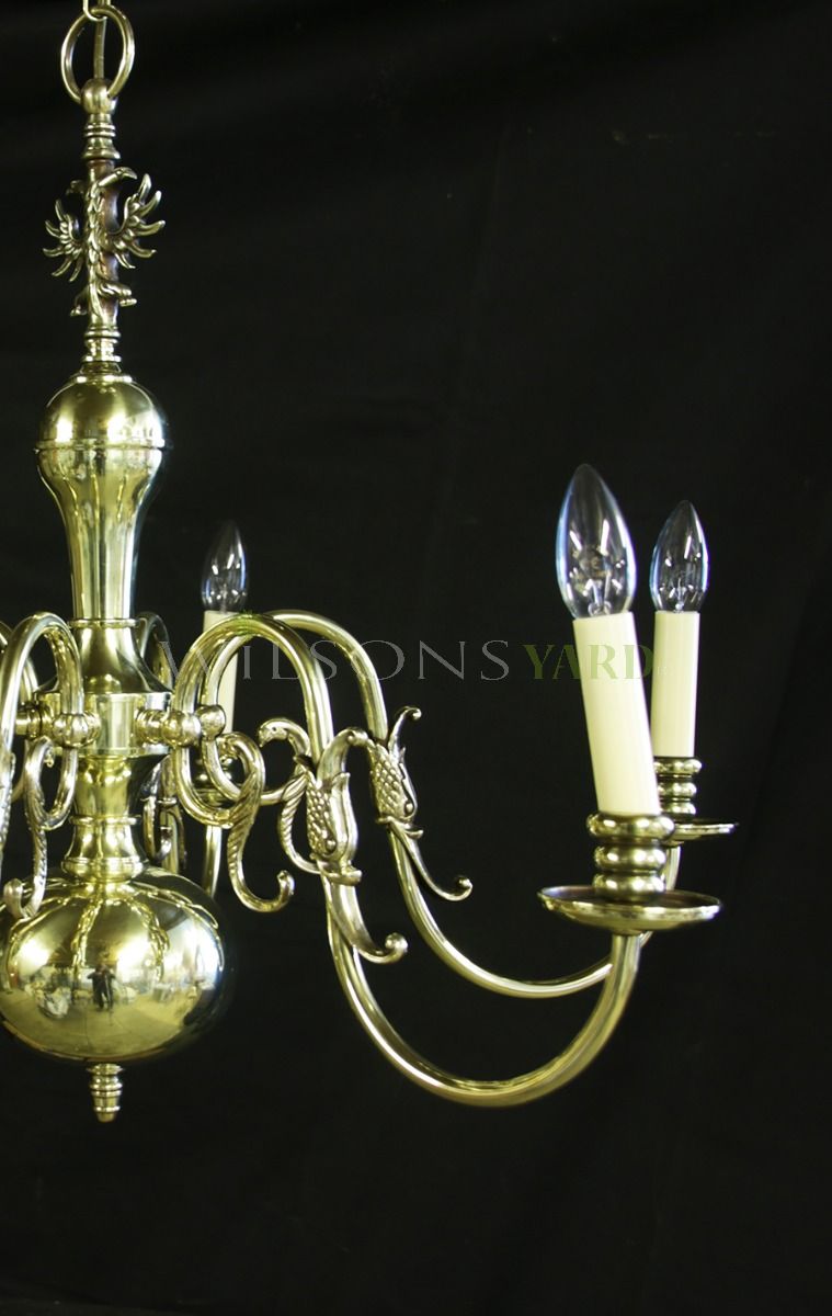 Vintage pair of restored brass chandeliers
