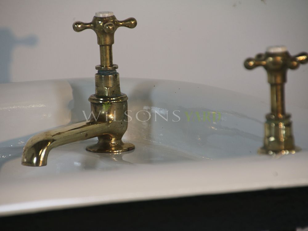 Original cast iron roll top bath with original taps