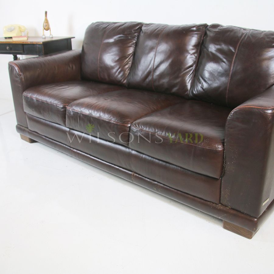 Three seater leather settee