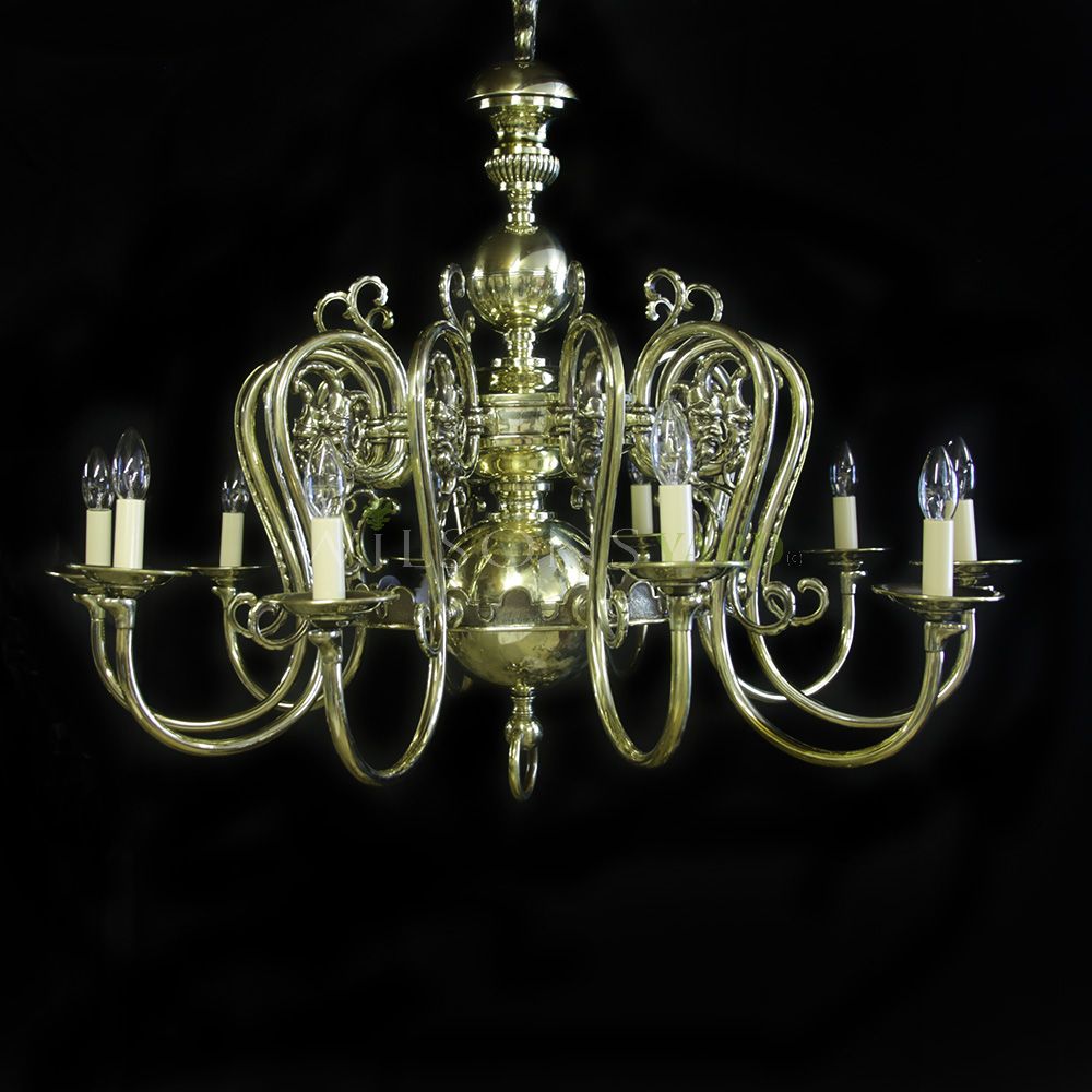 Beautiful pair of brass chandeliers