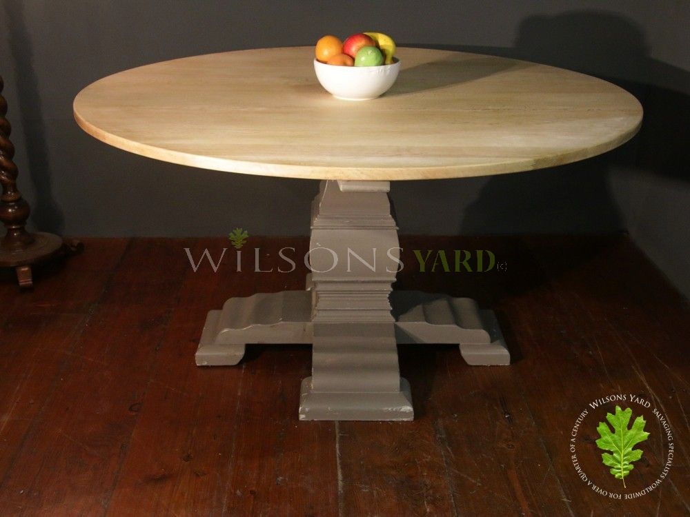 Circular Dining Table with a Reclaimed Oak Top and Decorative Wood Base