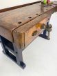 Vintage wooden bench with vice 