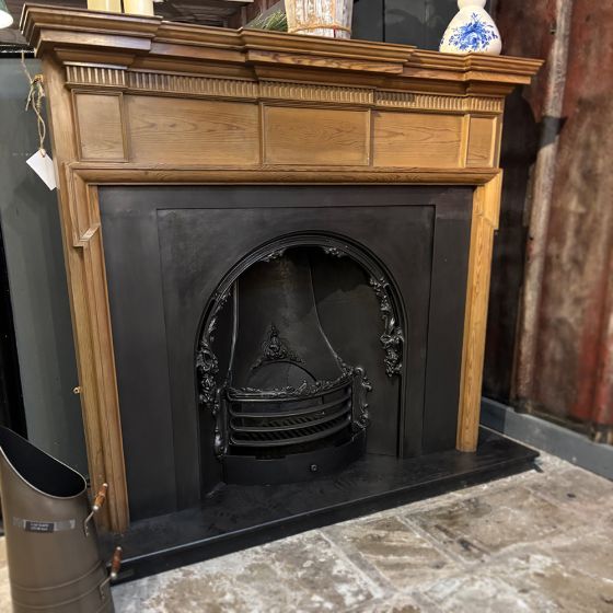 Edwardian wooden fireplace complete with insert