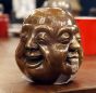 funny buddha head in bronze 
