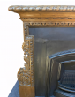 Vintage early 20th century wooden fire surround