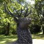 The Triton Collection - Reposing Stag On Plinth