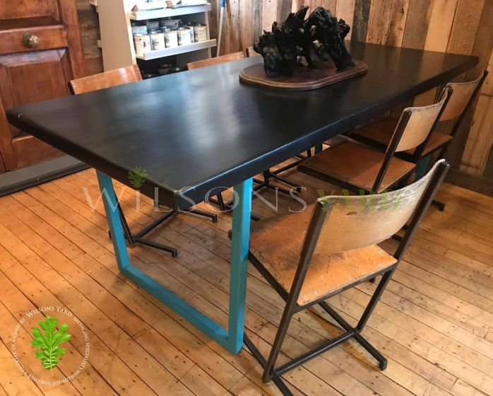 Reclaimed wooden table with metal base