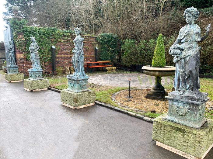 Stone garden sculptures the four seasons