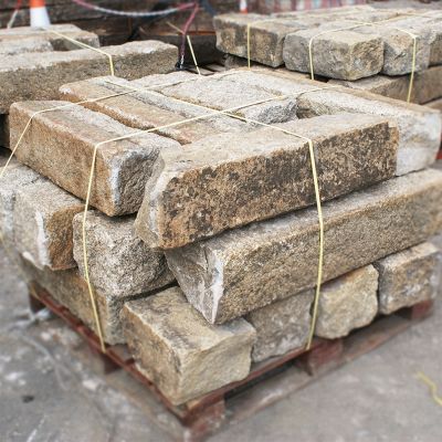 Reclaimed rare Mourne granite street kerbs
