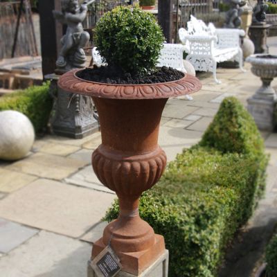 Pair of vintage cast iron garden urn planters 
