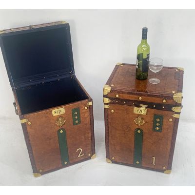 Large pair of restored leather travel trunks