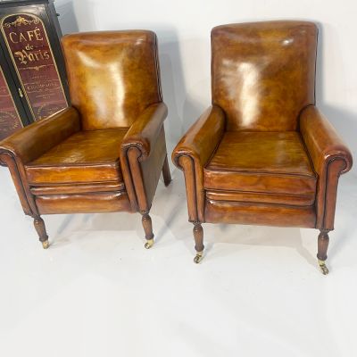 Pair of tan leather chairs
