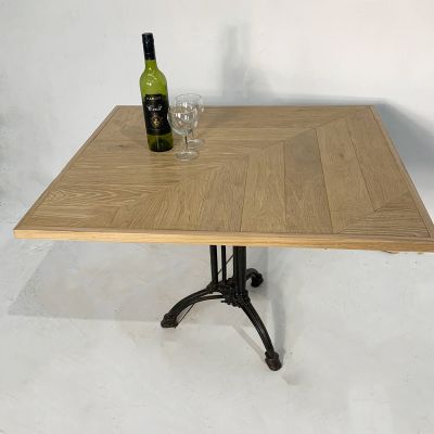 Small parquet topped table with metal legs