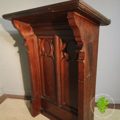 Decorative Gothic kneeler in pitch pine.