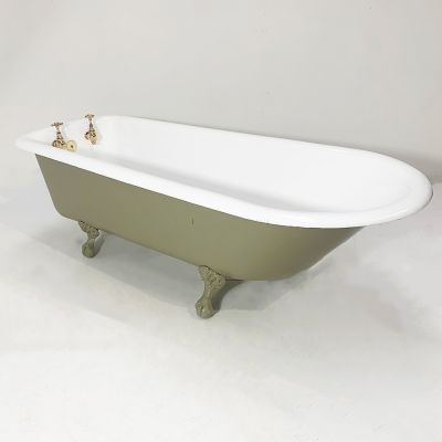 Restored Victorian roll top bath with globe taps