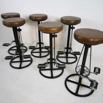 Pedal bicycle stools with leather seats