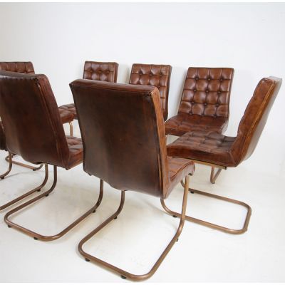 Pair of stylish leather dining chairs