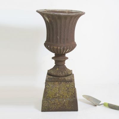 Petite antique cast iron Urn on plinth 