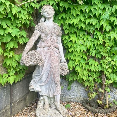 Stone spring maiden statue 