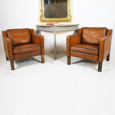  Pair of vintage Scandinavian tan leather arm chairs