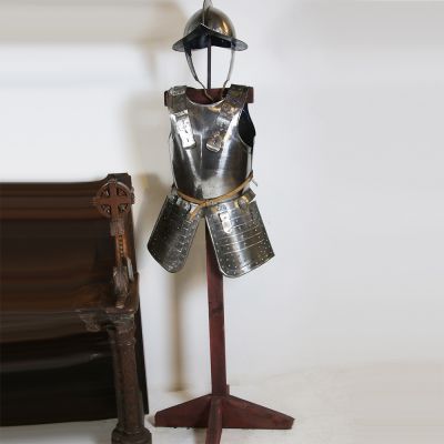 Museum copy of a 19th century English suit of armour 