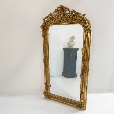 Carved gilded mirror