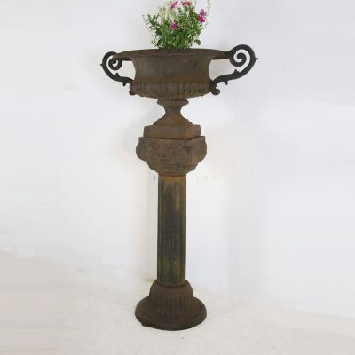 Classical cast iron urn on stand 