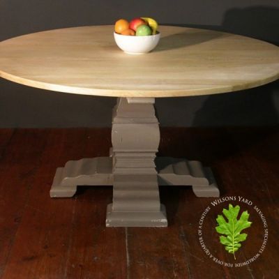 Circular Dining Table with a Reclaimed Oak Top and Decorative Wood Base 