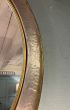 Large silvered circular mirror 