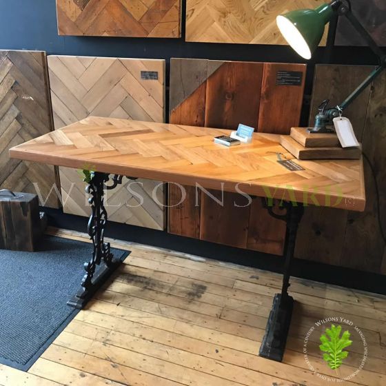 Parquet topped table with metal legs
