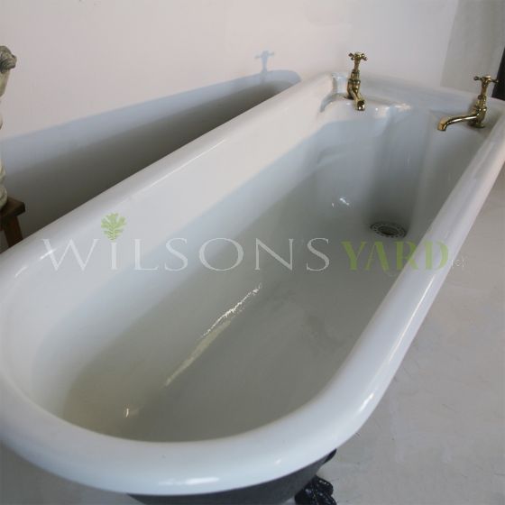 Original bath with brass taps.