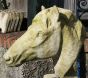 Pair of stone horses head statues