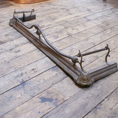 Original brass fire fender with sweeping detail