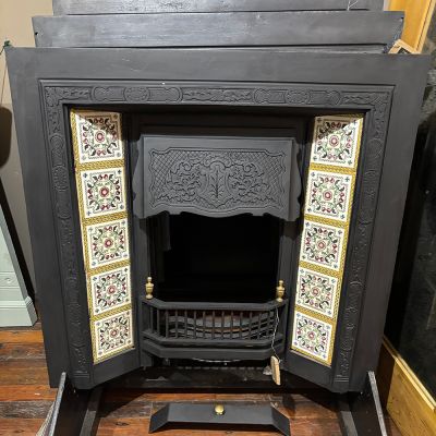 Beautiful Cast iron insert with original  tiles 
