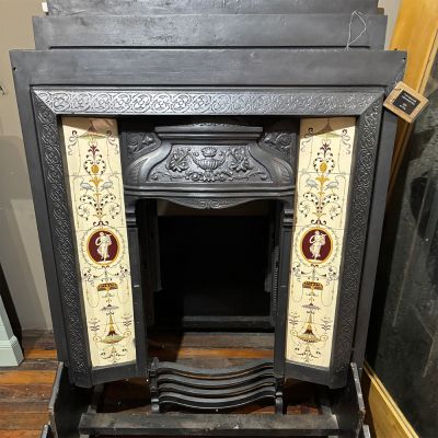 Cast iron insert with replacement tiles 