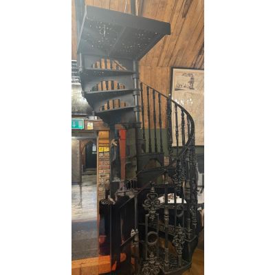 Cast iron spiral staircase with landing platform. Rising up 2580mm