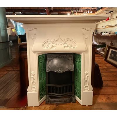 Restored 19th century Art Nouveau cast iron fireplace 