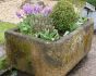 Antique garden trough planter